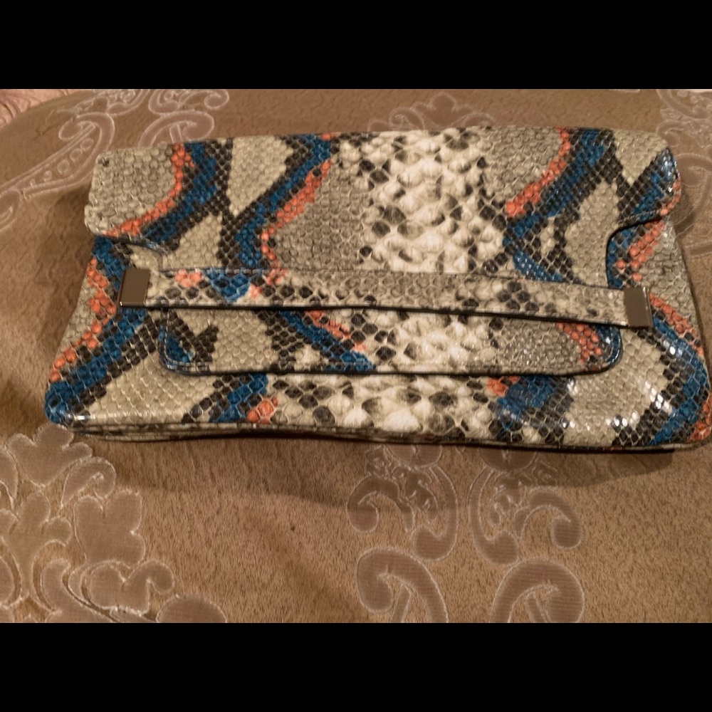 Snake skin clutch bag